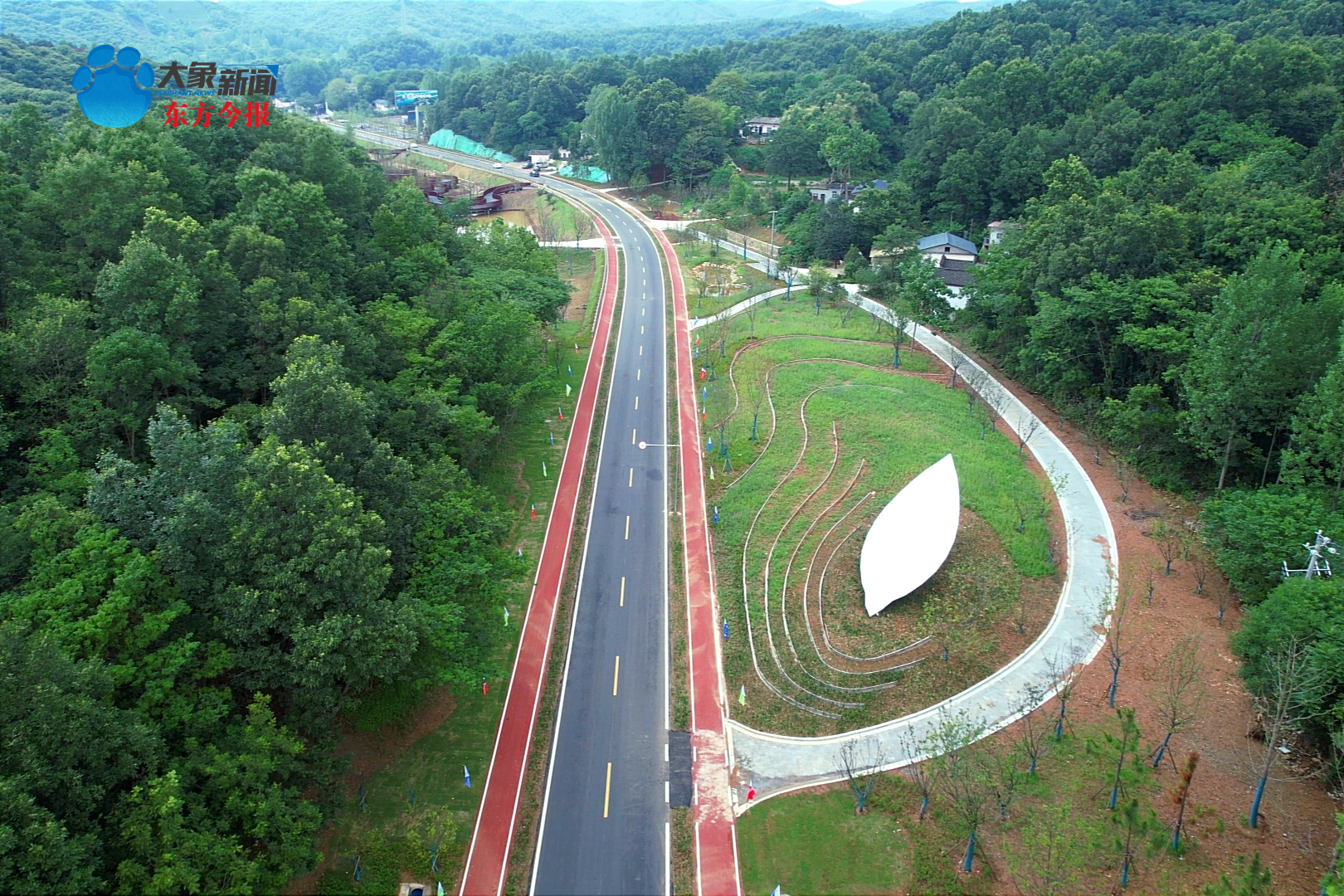 重点项目看信阳浉河区环湖路提质改造项目主体工程已完工打造茶乡廊道