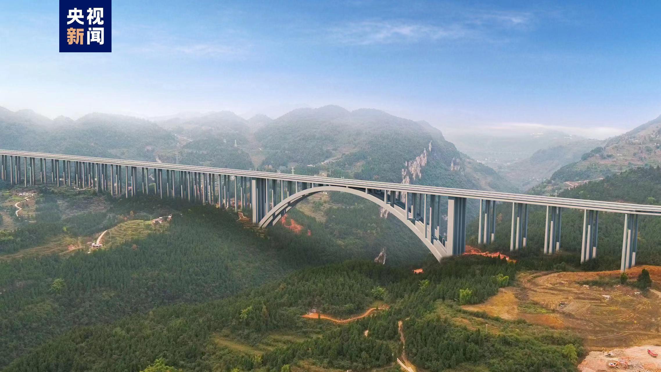 凌空架“飞虹”，世界最大跨径悬浇拱桥拱圈合龙(图2)