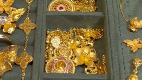 女子10年前给儿子买三金转手赚20万