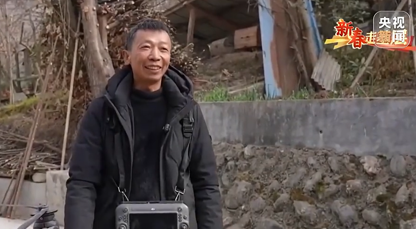 中国无人机大山里运腊肠，年货“飞”出深山