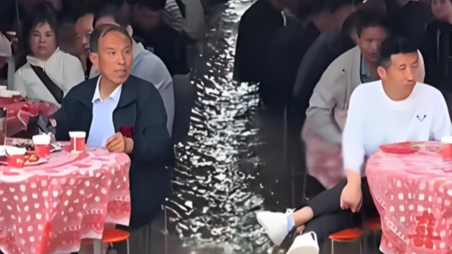 婚宴遇暴雨变“正宗流水席”，宾客淡定坐水中：没影响，大家都吃得开心