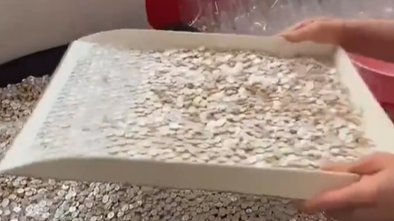 劳动人民的智慧！原来1000粒扣子是这样打包的